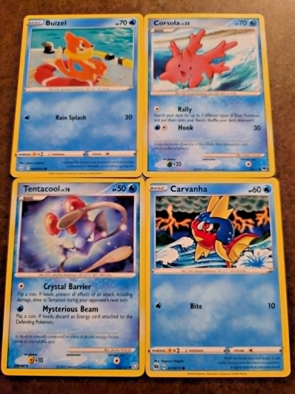 LOT OF 4 POKEMON CARDS water carvanha buizel corsola tentacool